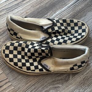 Vans Men's Black and Cream Checkered Slip-On Sneakers